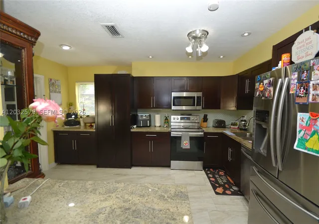 Photo 2 of Single family home for sale at 7470 Polk St, Hollywood, FL 33024 | MLS# A12032579 | Listing updated on 2026-09-09