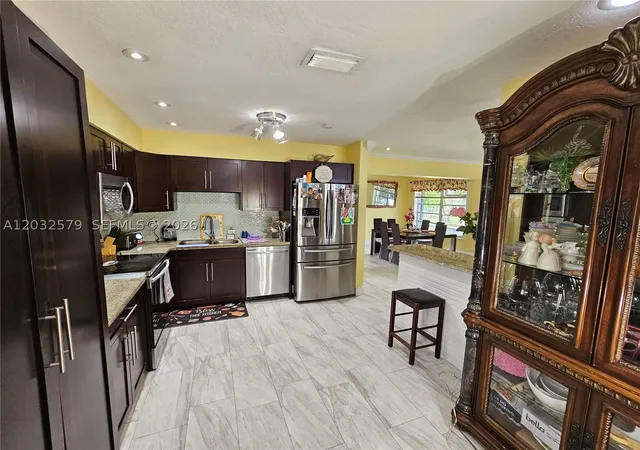 Photo 4 of Single family home for sale at 7470 Polk St, Hollywood, FL 33024 | MLS# A12032579 | Listing updated on 2026-09-09