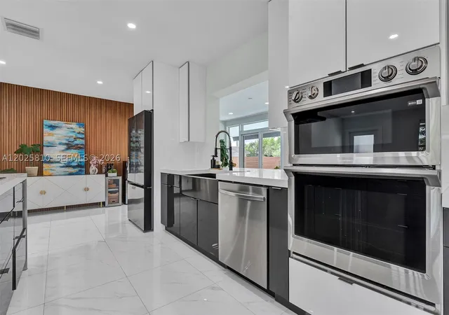 Photo 3 of Single family home for sale at 1446 Scott St, Hollywood, FL 33020 | MLS# A12025810 | Listing updated on 2026-09-18