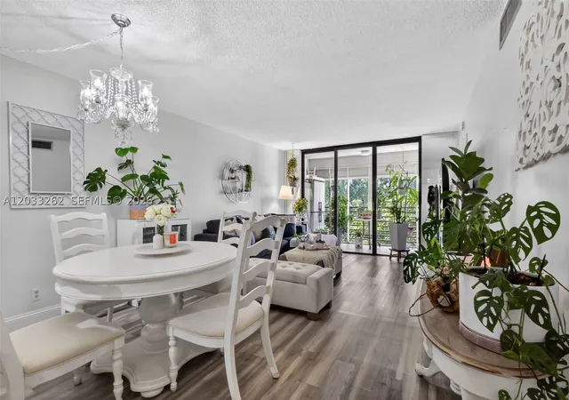 Listing Photo 1 - Condo for sale in building located at 8150 W Mcnab Rd, Tamarac, FL 33321 - Unit #304