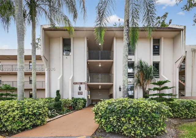 Listing Photo 2 - Condo for sale in building located at 8150 W Mcnab Rd, Tamarac, FL 33321 - Unit #304