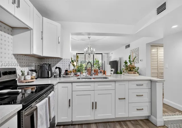 Listing Photo 3 - Condo for sale in building located at 8150 W Mcnab Rd, Tamarac, FL 33321 - Unit #304