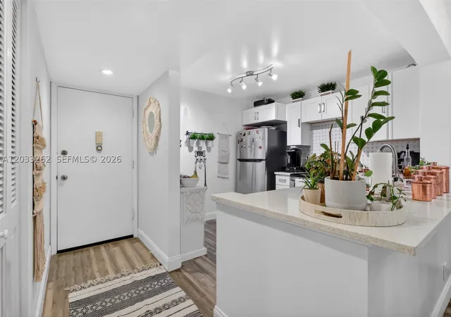 Listing Photo 5 - Condo for sale in building located at 8150 W Mcnab Rd, Tamarac, FL 33321 - Unit #304