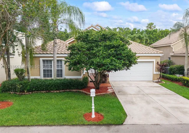 Photo 1 of Single family home for sale at 2013 Island Cir, Weston, FL 33326 | MLS# A12033663 | Listing updated on 2026-09-12