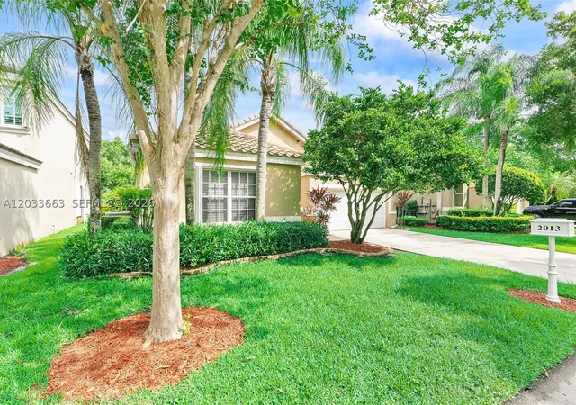 Photo 2 of Single family home for sale at 2013 Island Cir, Weston, FL 33326 | MLS# A12033663 | Listing updated on 2026-09-12