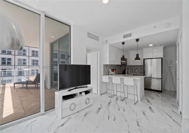 Photo 2 of Condo for sale at 300 S Biscayne Blvd #T-1411, Miami, FL 33131 | MLS# A12033411 | Listing updated on 2026-09-10