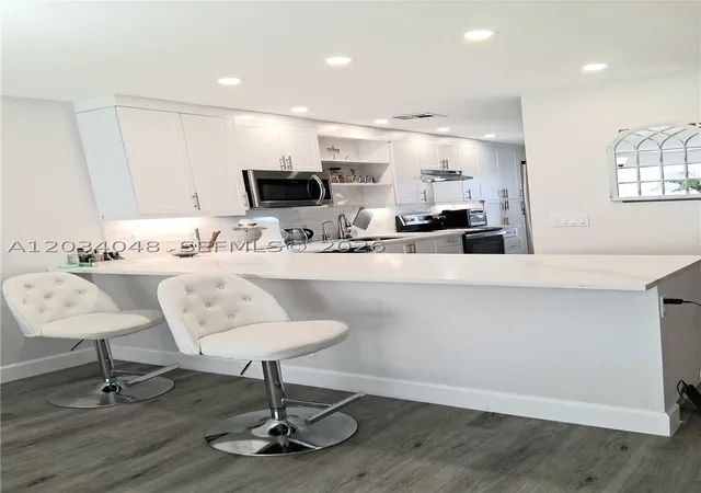 Photo 3 of Condo for sale at 1150 Boxwood Dr #101, Delray Beach, FL 33445 | MLS# A12034048 | Listing updated on 2026-08-26