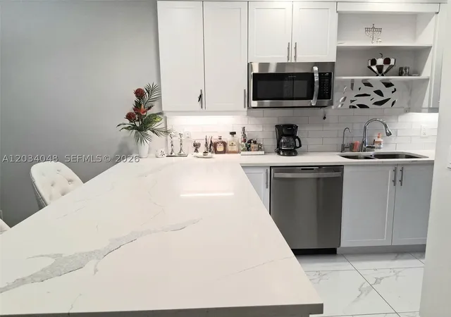 Photo 3 of Condo for sale at 1150 Boxwood Dr #101, Delray Beach, FL 33445 | MLS# A12034048 | Listing updated on 2026-08-26