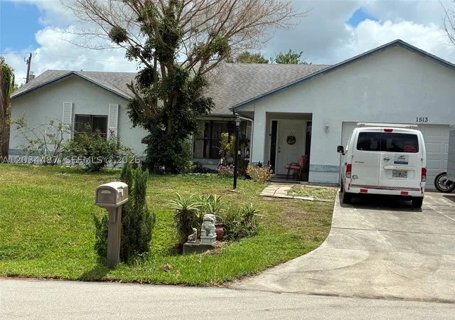 Photo 1 of Single family home for sale at 1513 Sw Apricot Rd, Port St Lucie, FL 34953 | MLS# A12034487 | Listing updated on 2026-10-07