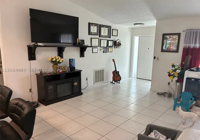 Photo 3 of Single family home for sale at 1513 Sw Apricot Rd, Port St Lucie, FL 34953 | MLS# A12034487 | Listing updated on 2026-10-07