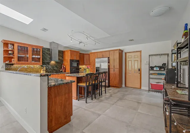 Photo 3 of Single family home for sale at 15741 Sw 147th Ct, Miami, FL 33187 | MLS# A12036245 | Listing updated on 2026-10-03