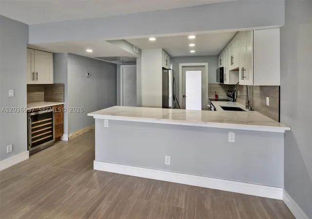 Photo 1 of Condo for sale at 2940 N Course Dr #311, Pompano Beach, FL 33069 | MLS# A12036597 | Listing updated on 2026-09-22
