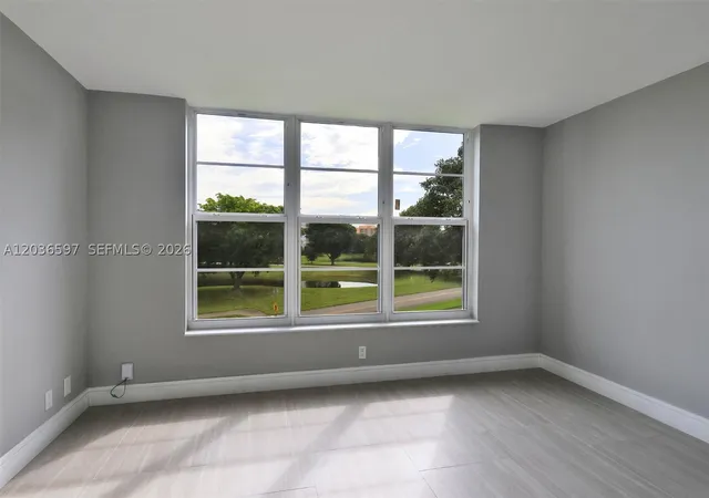 Photo 3 of Condo for sale at 2940 N Course Dr #311, Pompano Beach, FL 33069 | MLS# A12036597 | Listing updated on 2026-09-22