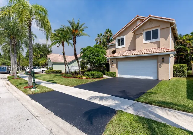 Photo 2 of Sale Pending at 1171 Laguna Springs Dr, Weston, FL 33326 | MLS# A12036644 | Listing updated on 2026-09-02