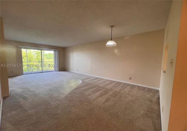 Photo 4 of Condo for sale at 1075 Riverside Dr #505, Coral Springs, FL 33071 | MLS# A12036171 | Listing updated on 2026-09-15