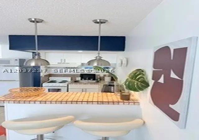 Photo 1 of Condo for sale at 13 Ne 2nd Ave #203, Dania Beach, FL 33004 | MLS# A12037237 | Listing updated on 2026-09-14