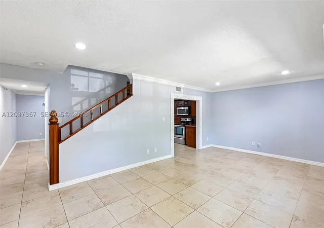 Photo 3 of Townhouse for sale at 86 Ann Lee Ln, Tamarac, FL 33319 | MLS# A12037367 | Listing updated on 2026-10-02