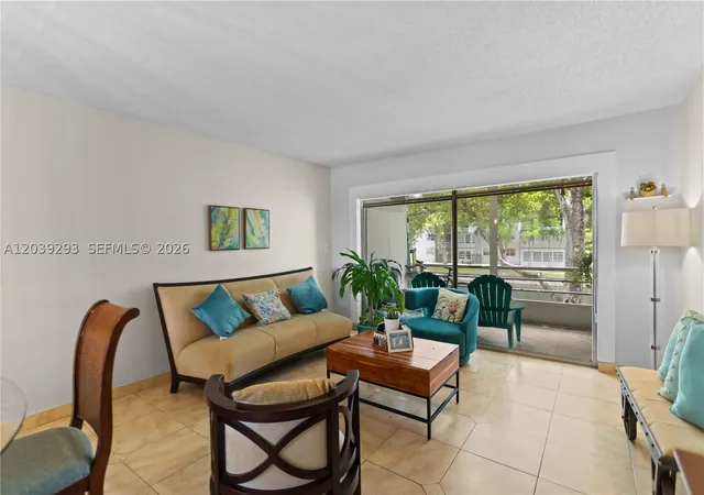 Listing Photo 3 - Condo for sale in building located at 8846 W Mcnab Rd, Tamarac, FL 33321 - Unit #206
