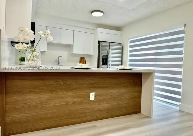 Photo 1 of Townhouse for sale at 2565 Garden Ct, Cooper City, FL 33026 | MLS# A12038086 | Listing updated on 2026-09-09