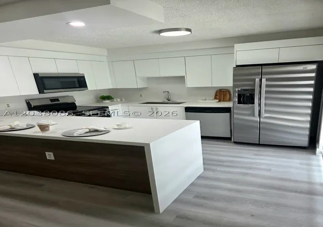 Photo 3 of Townhouse for sale at 2565 Garden Ct, Cooper City, FL 33026 | MLS# A12038086 | Listing updated on 2026-09-09
