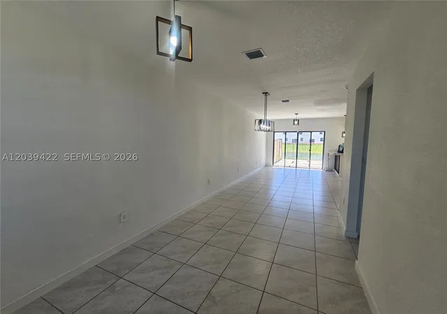 Photo 2 of Townhouse for sale at 1473 Ne 5th Ave #1473, Florida City, FL 33034 | MLS# A12039422 | Listing updated on 2026-09-10