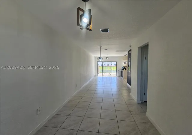 Photo 3 of Townhouse for sale at 1473 Ne 5th Ave #1473, Florida City, FL 33034 | MLS# A12039422 | Listing updated on 2026-09-10