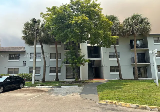 Listing Photo 1 - Condo for sale in building located at 7200 Nw 179Th St, Miami, FL 33015 - Unit #311