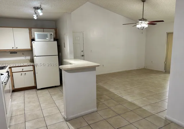 Listing Photo 4 - Condo for sale in building located at 7200 Nw 179Th St, Miami, FL 33015 - Unit #311