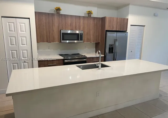 Photo 3 of Condo for sale at 8025 Nw 104th Ave #31, Doral, FL 33178 | MLS# A12040084 | Listing updated on 2026-09-14