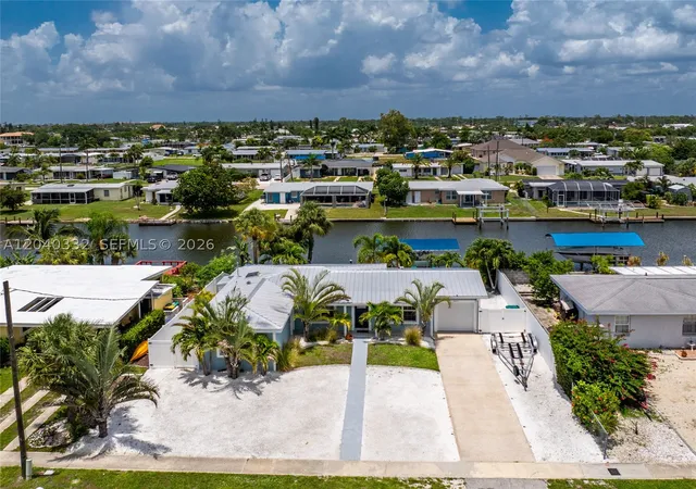 Photo 2 of Single family home for sale at 21812 Edgewater Dr, Port Charlotte, FL 33952 | MLS# A12040332 | Listing updated on 2026-09-06
