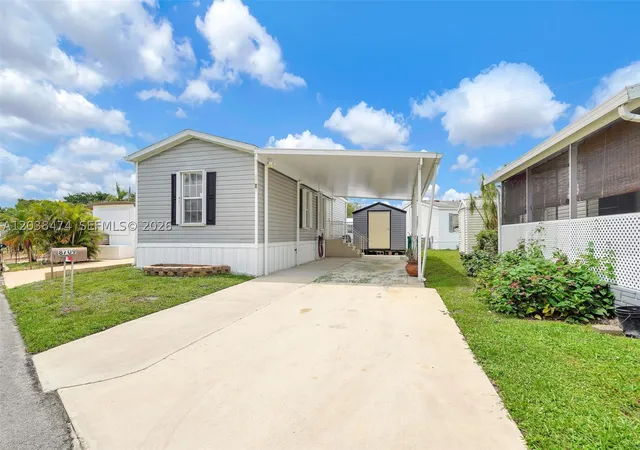 Photo 1 of Manufactured home for sale at 8709 Sw 17th Ct, Davie, FL 33324 | MLS# A12038474 | Listing updated on 2026-09-14