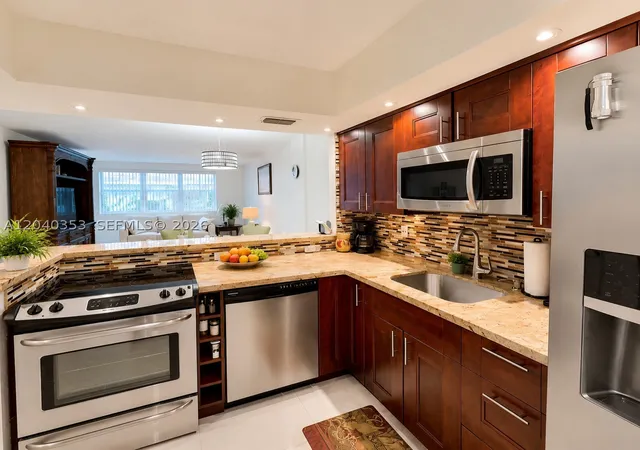 Photo 1 of Condo for sale at 1333 E Hallandale Beach Blvd #106, Hallandale Beach, FL 33009 | MLS# A12040353 | Listing updated on 2026-09-27