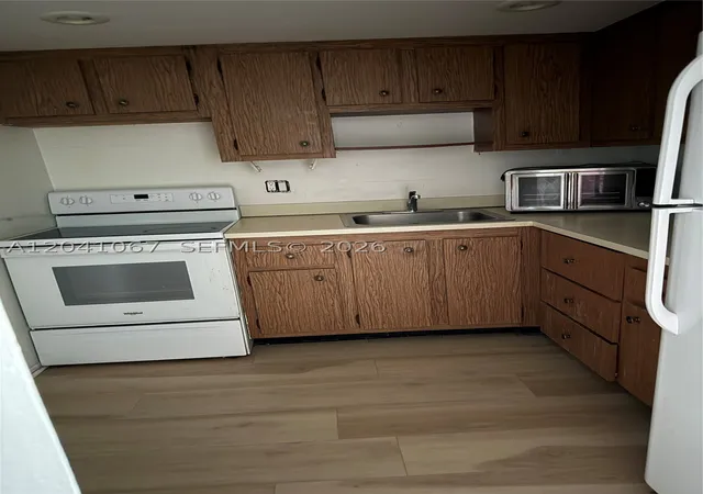 Photo 2 of Condo for sale at 1825 W 44Th Pl #707, Hialeah, FL 33012 | MLS# A12041067 | Listing updated on 2026-10-02