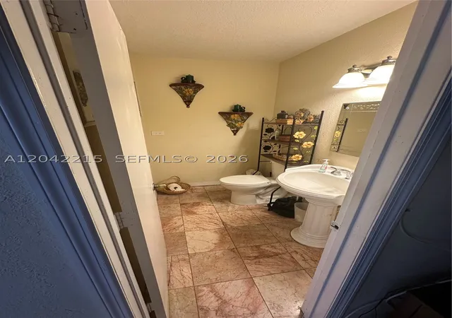 Photo 4 of Townhouse for sale at 2700 Nw 47Th Ter #1001, Lauderdale Lakes, FL 33313 | MLS# A12042215 | Listing updated on 2026-09-29
