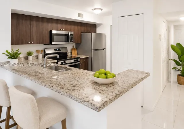 Listing Photo 4 - Condo for sale in building located at 11177 Sw 8Th St, Pembroke Pines, FL 33025 - Unit #208