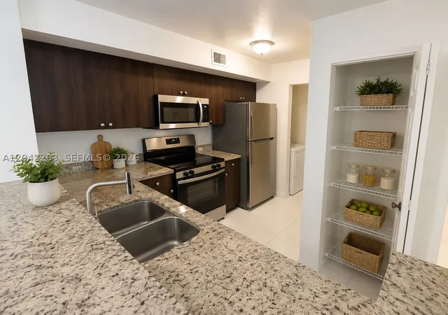 Listing Photo 5 - Condo for sale in building located at 11177 Sw 8Th St, Pembroke Pines, FL 33025 - Unit #208