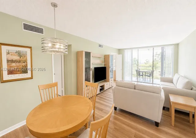 Photo 2 of Condo for sale at 2671 S Course Dr #208, Pompano Beach, FL 33069 | MLS# A12042479 | Listing updated on 2026-09-11