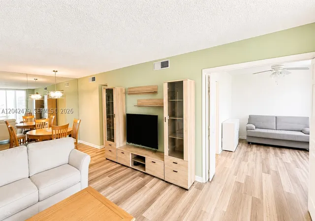 Photo 3 of Condo for sale at 2671 S Course Dr #208, Pompano Beach, FL 33069 | MLS# A12042479 | Listing updated on 2026-09-11