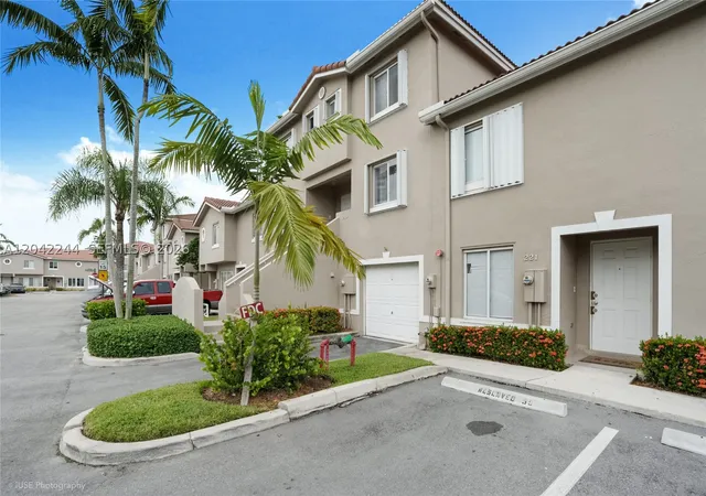 Photo 1 of Townhouse for sale at 221 Riviera Cir, Weston, FL 33326 | MLS# A12042244 | Listing updated on 2026-09-10