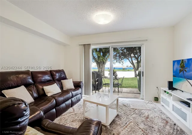 Photo 3 of Townhouse for sale at 221 Riviera Cir, Weston, FL 33326 | MLS# A12042244 | Listing updated on 2026-09-10