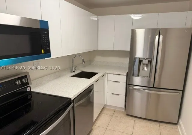 Photo 1 of Condo for sale at 8405 Nw 8th St #303, Miami, FL 33126 | MLS# A12043026 | Listing updated on 2026-08-27