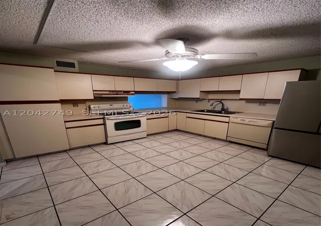 Photo 4 of Condo for sale at 4975 E Sabal Palm Blvd #304, Tamarac, FL 33319 | MLS# A12042749 | Listing updated on 2026-09-08