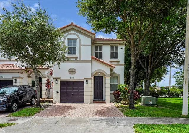 Photo 1 of Condo for sale at 10709 Nw 81st Ln, Doral, FL 33178 | MLS# A12044639 | Listing updated on 2026-09-02