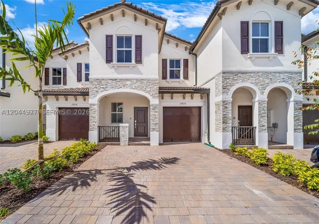 Photo 1 of Townhouse for sale at 12942 Nw 23rd Pl, Miami, FL 33167 | MLS# A12044927 | Listing updated on 2026-09-10