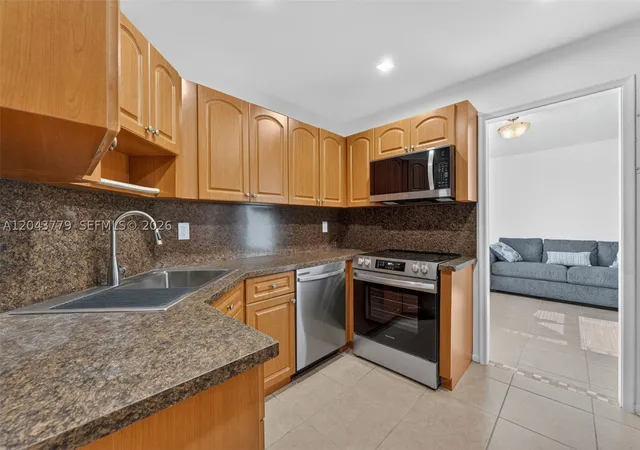 Photo 1 of Condo for sale at 3301 Spanish Moss Ter #405, Lauderhill, FL 33319 | MLS# A12043779 | Listing updated on 2026-09-10