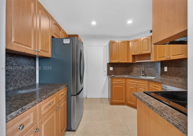 Photo 3 of Condo for sale at 3301 Spanish Moss Ter #405, Lauderhill, FL 33319 | MLS# A12043779 | Listing updated on 2026-09-10