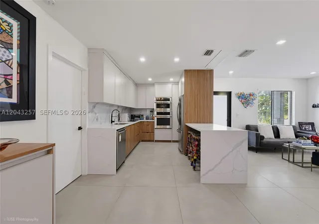 Photo 3 of Single family home for sale at 2450 Ne 209th Ter, Miami, FL 33180 | MLS# A12043257 | Listing updated on 2026-09-08