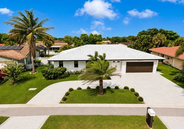 Photo 1 of Single family home for sale at 3023 Nw 123rd Ave, Coral Springs, FL 33065 | MLS# A12044998 | Listing updated on 2026-09-01