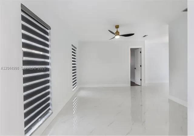 Photo 3 of Single family home for sale at 3023 Nw 123rd Ave, Coral Springs, FL 33065 | MLS# A12044998 | Listing updated on 2026-09-01