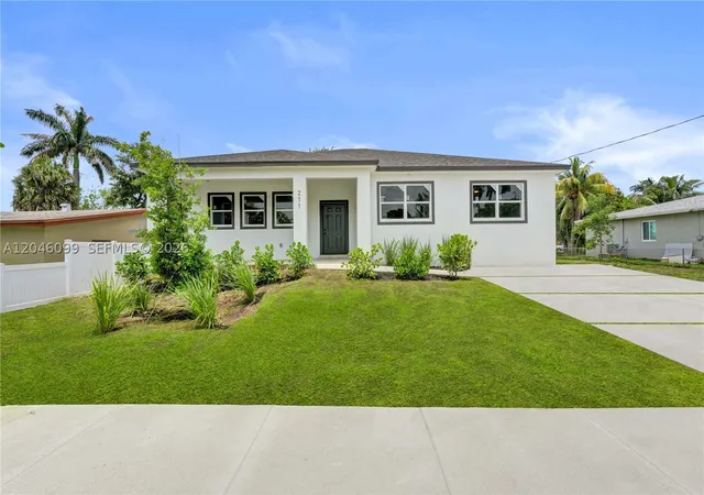 Photo 1 of Single family home for sale at 211 Nw 14th Ct, Dania, FL 33004 | MLS# A12046099 | Listing updated on 2026-09-04